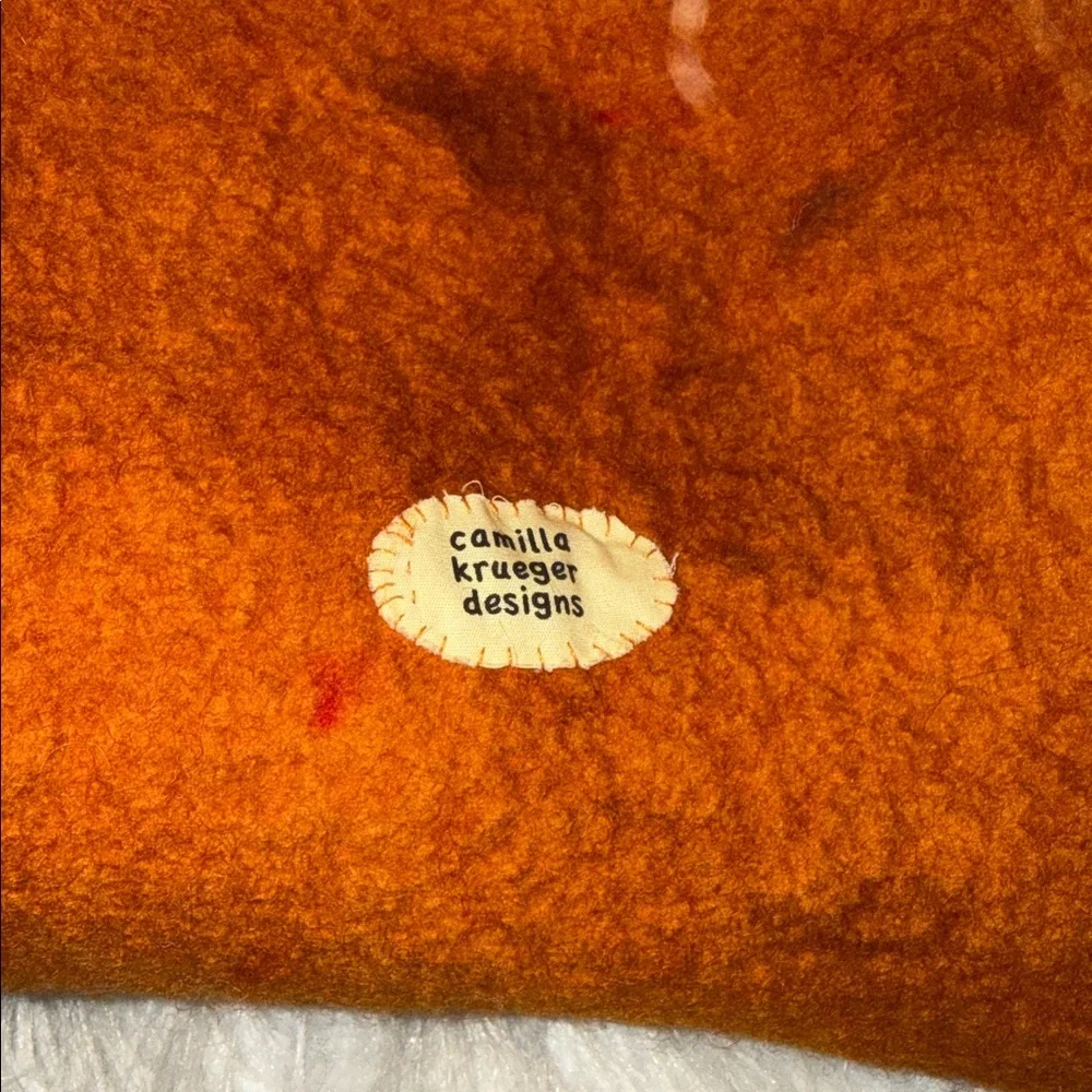 Camilla Krueger Designs orange marbled artisan hand-felted wool sculptural hat
